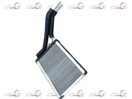 CarTrends heater core for Suzuki Swift Dezire, spare parts image showing the metal core with inlet and outlet fittings.
