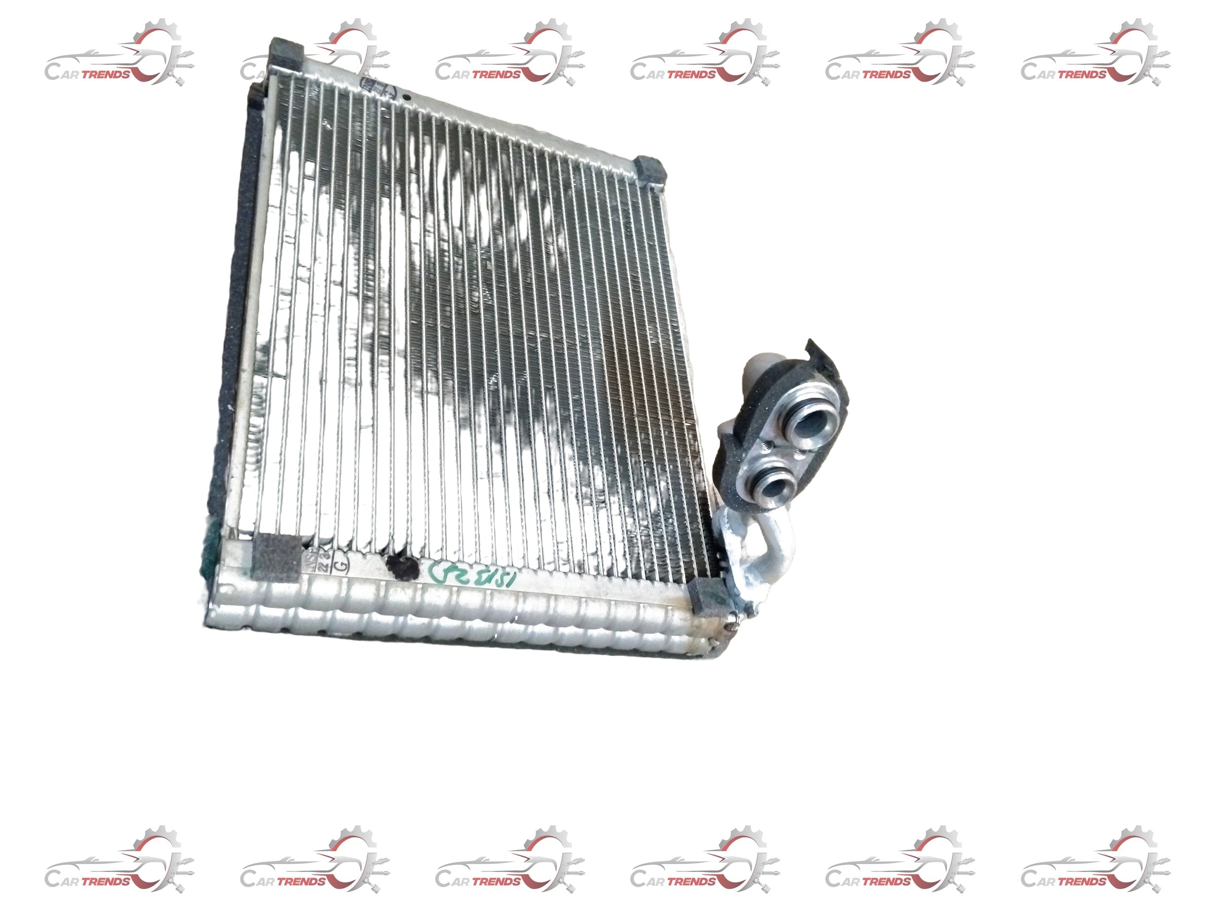 Maruti Suzuki evaporator assembly part 95411M83P00 showing metal and plastic components for vehicle air conditioning system.