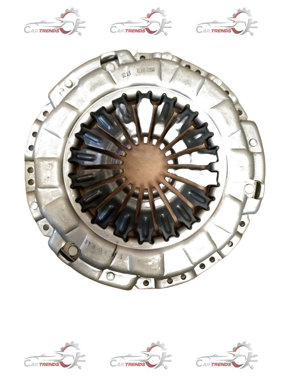 Hyundai clutch cover assembly showing metal clutch cover with mounting points and components for vehicle repair.