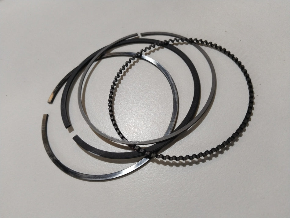 Maruti Suzuki piston ring set for WagonR, A-Star, and Estilo models, showing a close-up of the engine piston rings.