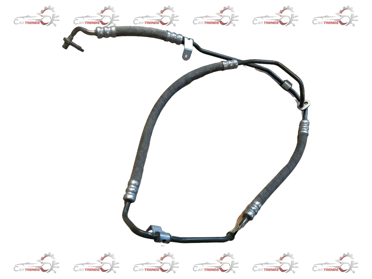 Renault power steering high pressure tube by CarTrends, showing the metal tube with fittings for vehicle steering system.
