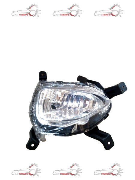 Hyundai I20 front fog lamp spare part by CarTrends, showing the clear lens and mounting bracket for vehicle lighting.