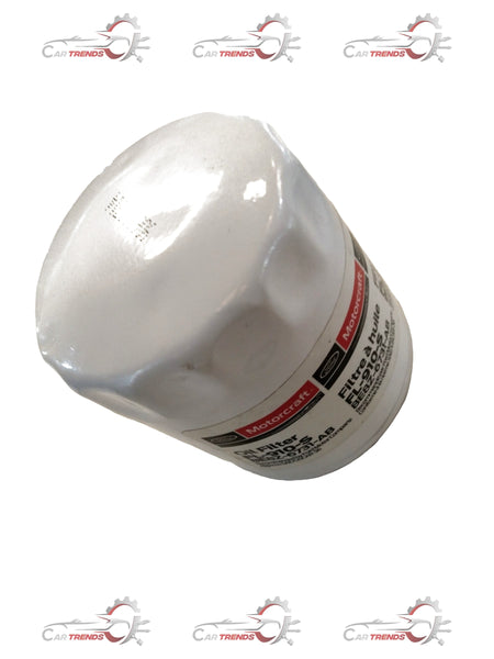CarTrends Ford oil filter BE8Z6731AC, cylindrical filter with metal body and rubber sealing ring for engine oil filtration.