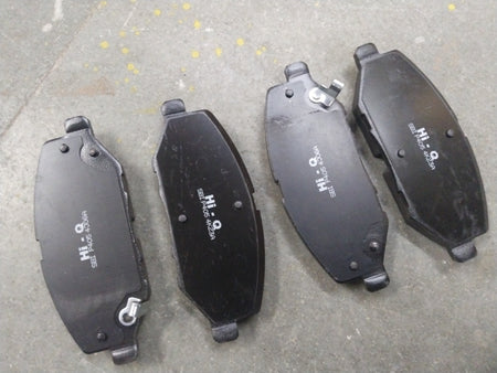 Front brake pad for Altroz DSL/Nexon EV by CarTrends, basalt material, shown in a close-up image.