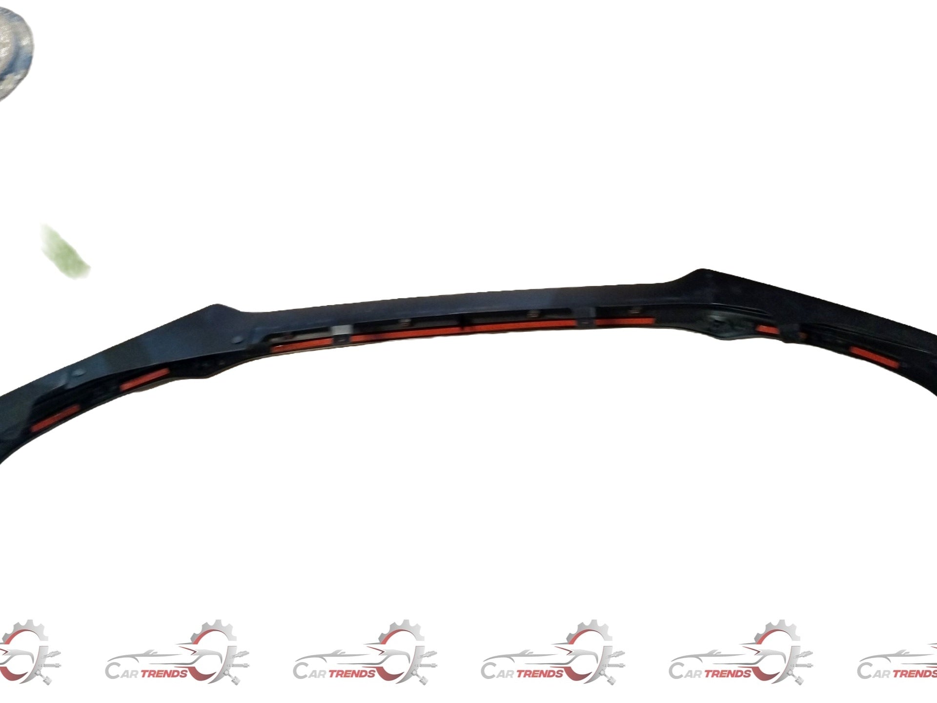Maruti Suzuki complete bumper extension for Suzuki Swift, showing a close-up of the bumper component in a natural setting.