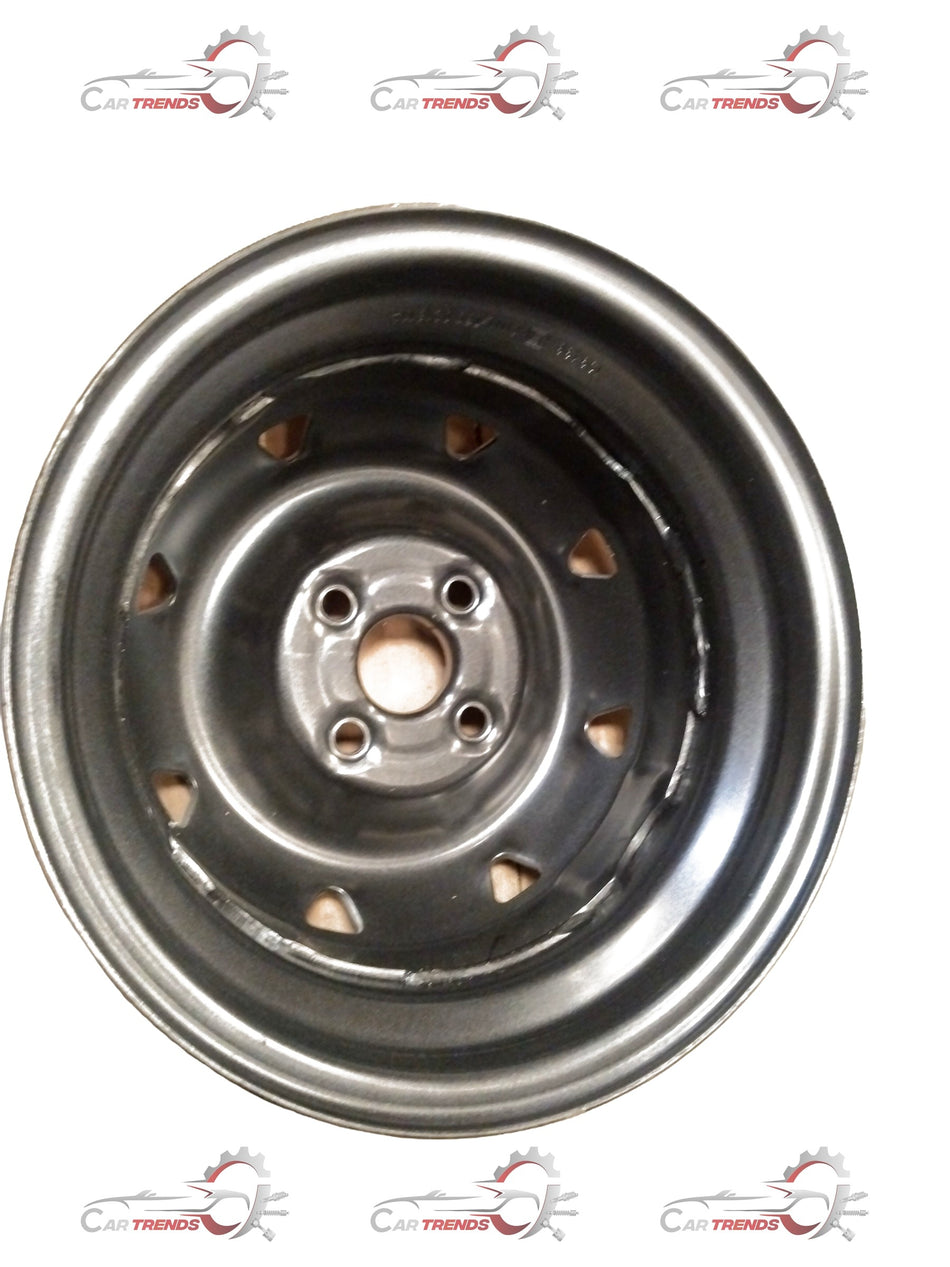 Mahindra Maxximo wheel rim by CarTrends, showing a close-up of the black alloy rim with detailed design and branding.
