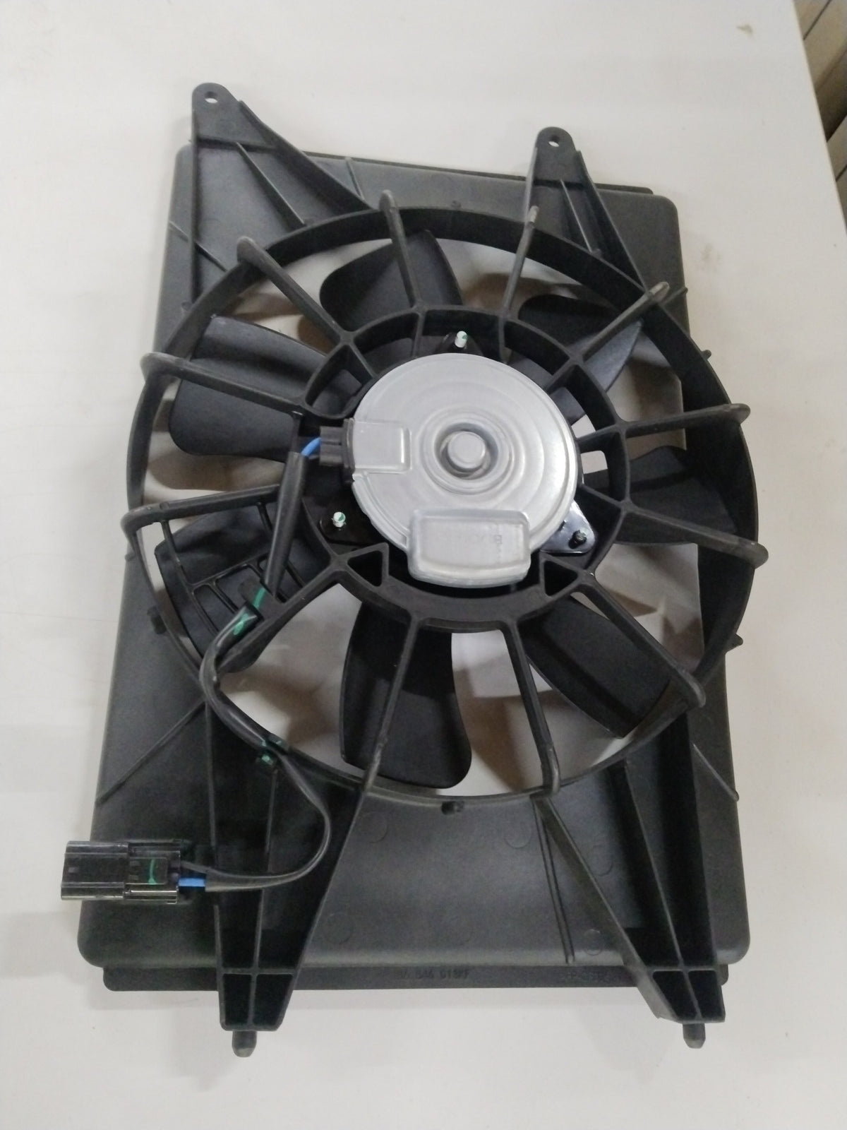 CarTrends fan shroud for Honda City, showing the black plastic cooling fan cover with mounting clips and structural details.