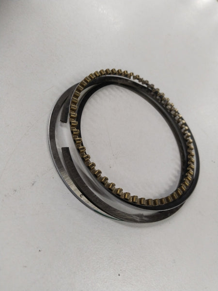 Chevrolet Corsa piston ring kit 1.6L standard size by General Motors, showing metal piston rings on a white background.