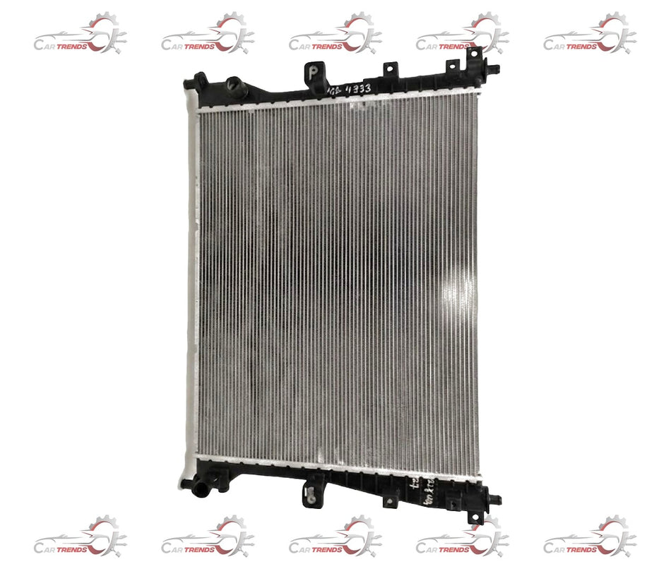 Maruti Suzuki radiator assembly for Ciaz and S-Cross 1.3L DDiS diesel engine, showing the metal radiator core and hoses.