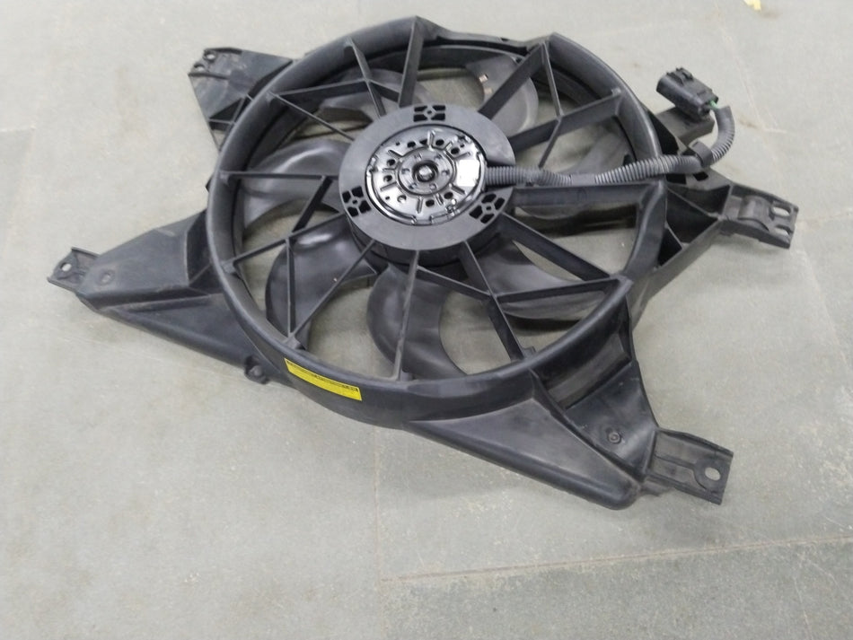 Chevrolet Optra fan main, general motors part, showing a metal fan with blades and mounting frame for vehicle cooling.