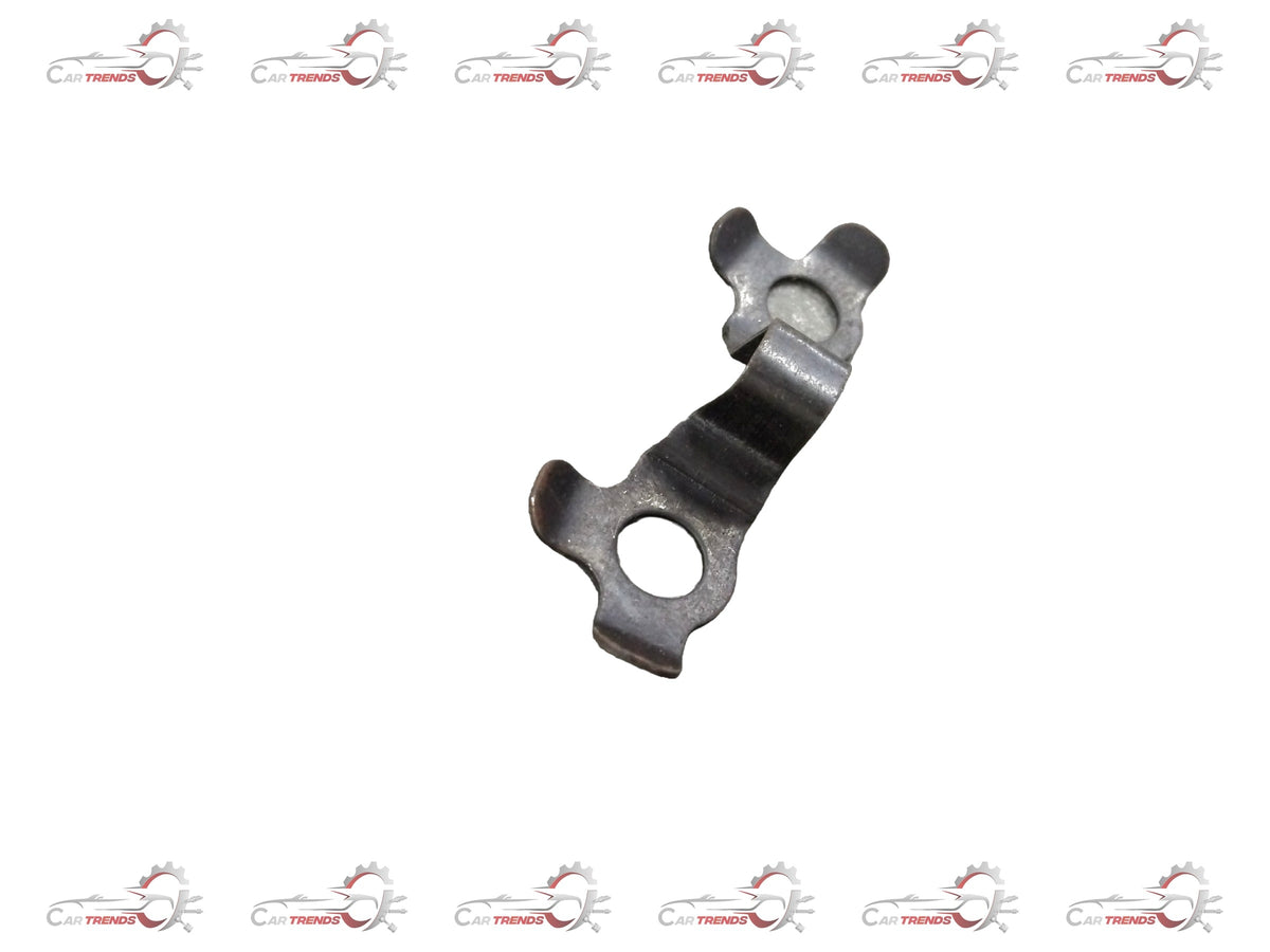 General Motors Chevrolet Tavera lock strap securing vehicle components in a close-up shot.
