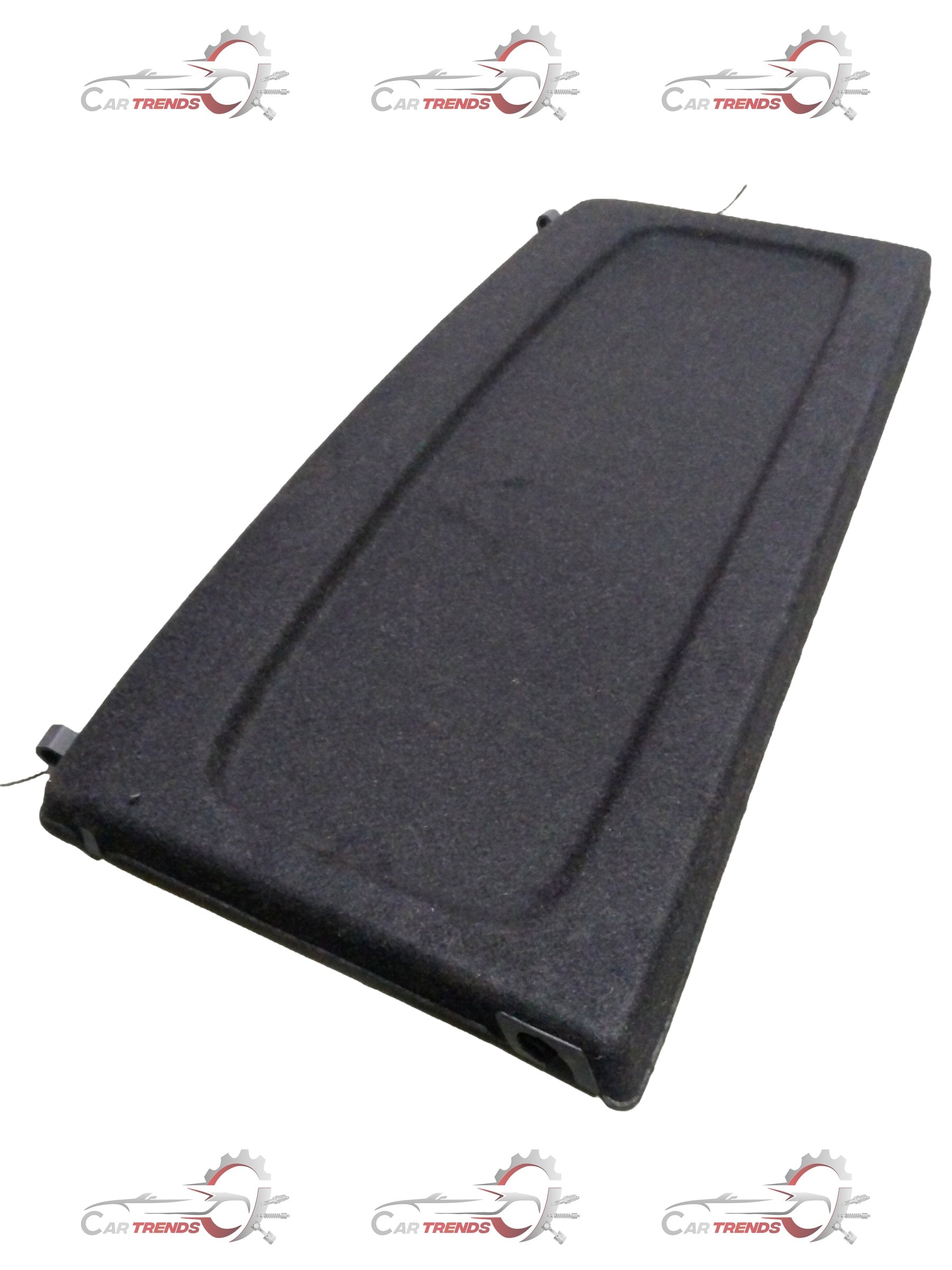 Maruti Suzuki rear parcel shelf for car interior, showing the black plastic panel with mounting points and side brackets.