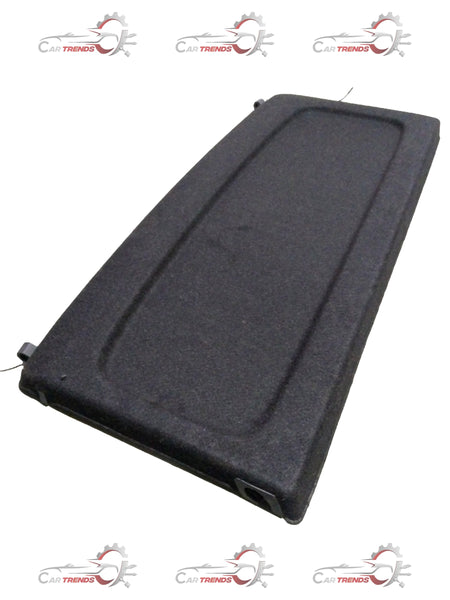 Maruti Suzuki rear parcel shelf for car interior, showing the black plastic panel with mounting points and side brackets.