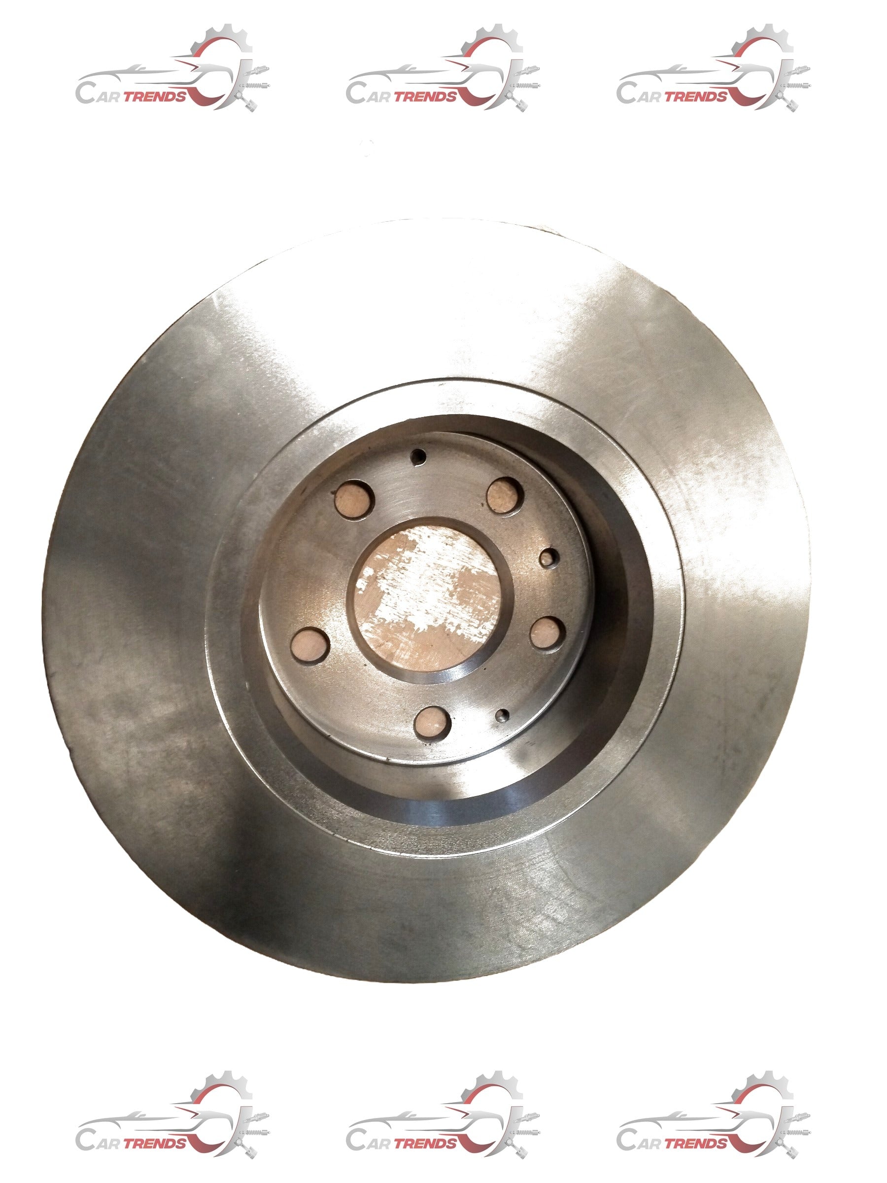 Front Mahindra Scorpio brake disc with vented design, showing the metallic surface and mounting holes for installation.