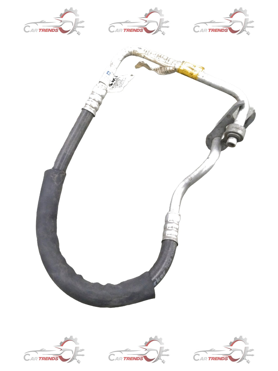 Refrigerant discharge hose assembly for Chevrolet Optra engine, showing metal fittings and flexible hose components.