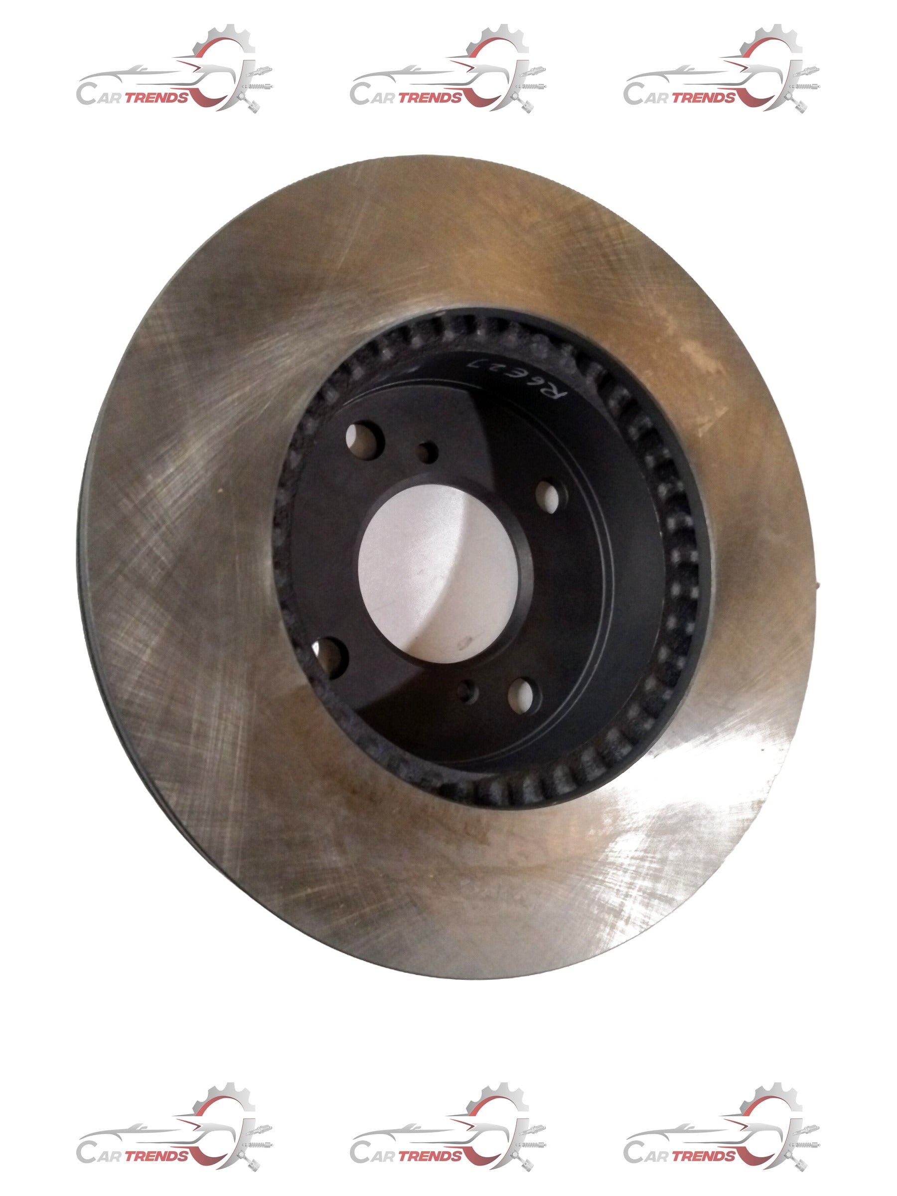 Front disc brake for Maruti Suzuki Ritz, Swift, or Dzire, showing the metallic brake rotor and caliper assembly.