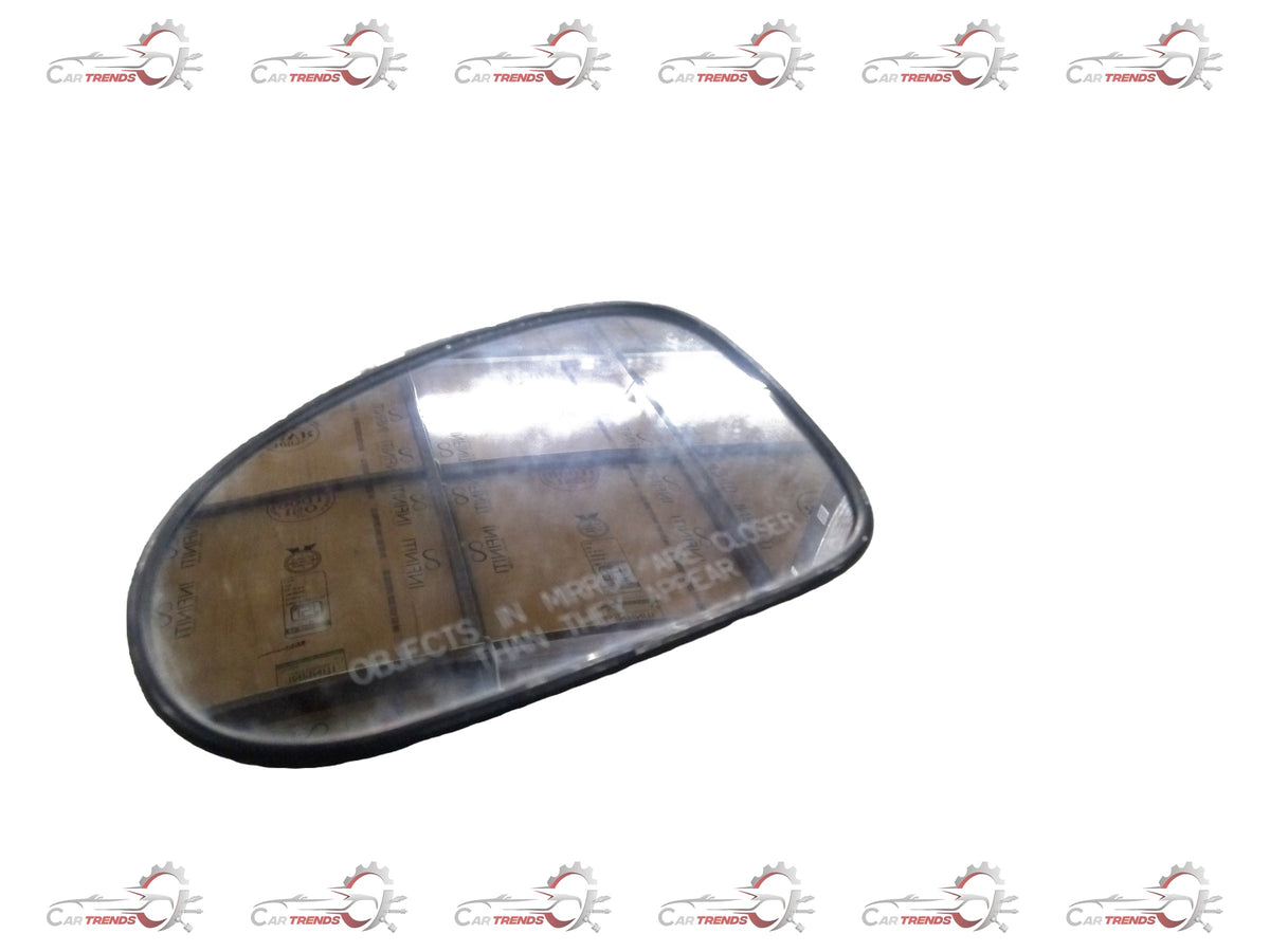 CarTrends mirror glass assembly for Chevrolet Spark LH side, spare part with reflective glass and mounting frame.