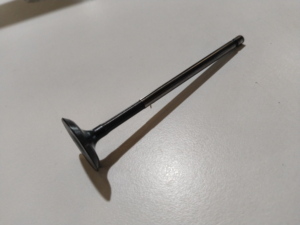Maruti Suzuki Alto intake valve, engine component, metallic part with precise machining, designed for optimal engine performance.