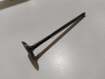 Maruti Suzuki Alto intake valve, engine component, metallic part with precise machining, designed for optimal engine performance.