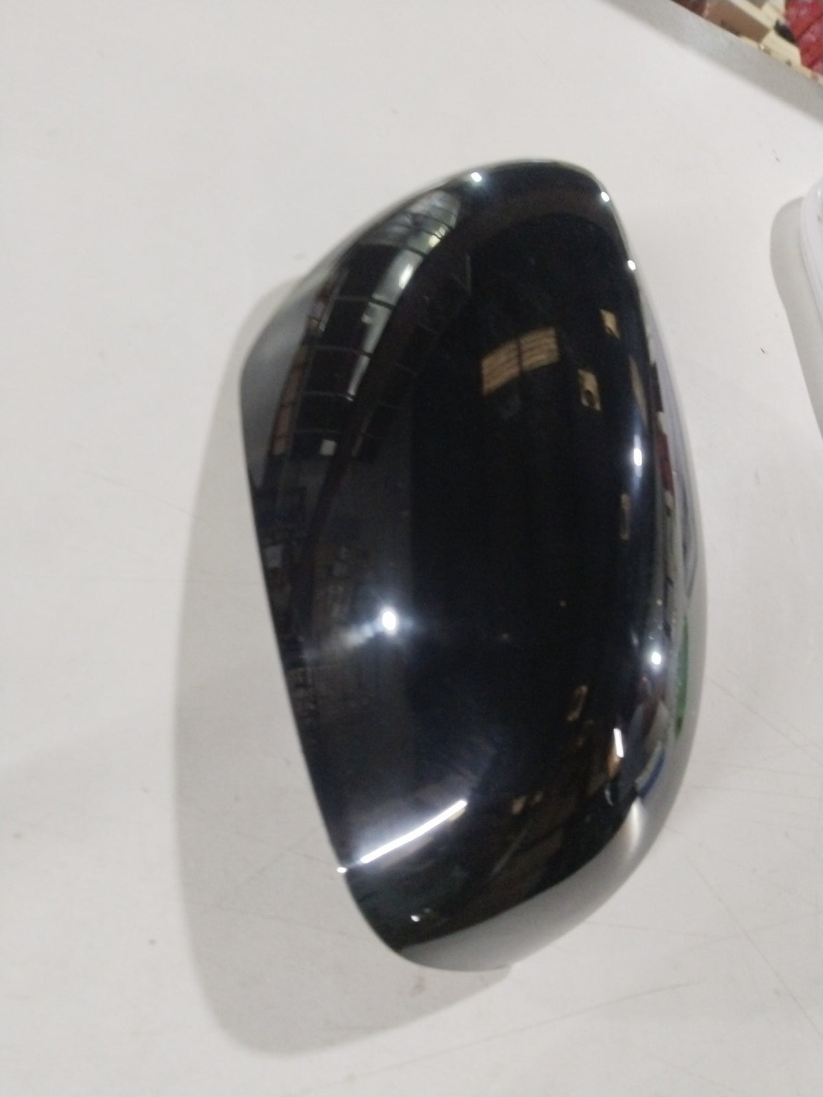 Maruti Suzuki outside mirror visor cover for right side, compatible with Swift, Dzire, and Baleno models, in black plastic.