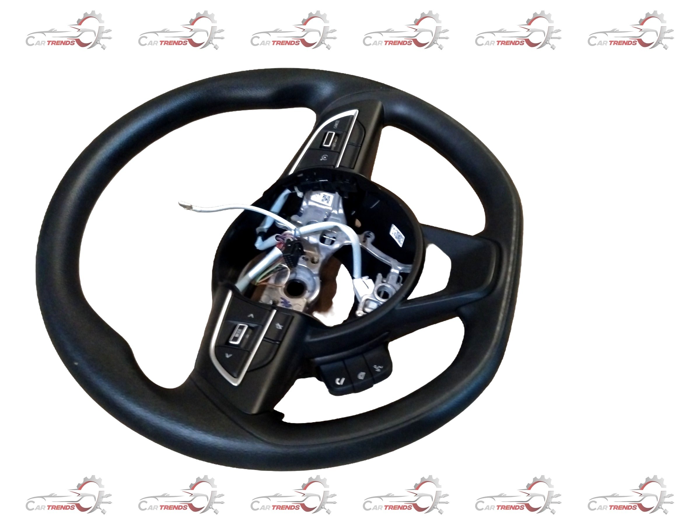 Maruti Suzuki XL6 or Brezza base model steering wheel with black and silver design, mounted on the vehicle's dashboard.