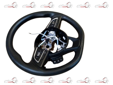 Maruti Suzuki XL6 or Brezza base model steering wheel with black and silver design, mounted on the vehicle's dashboard.