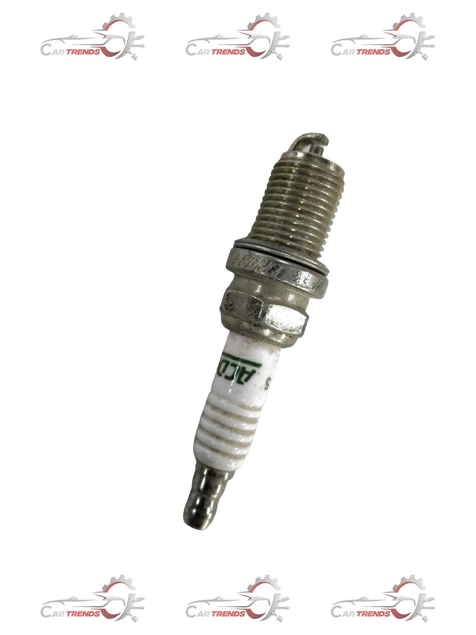 AC Delco spark plug for Chevrolet cars, all variants, showing the metal and ceramic components of the CarTrends product.