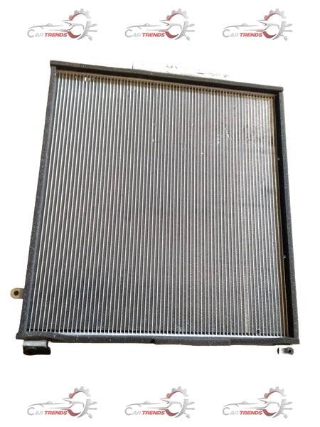 CarTrends AC condenser for Brezza 2nd Gen 2022+ petrol and CNG models, front view showing metal fins and connection points.