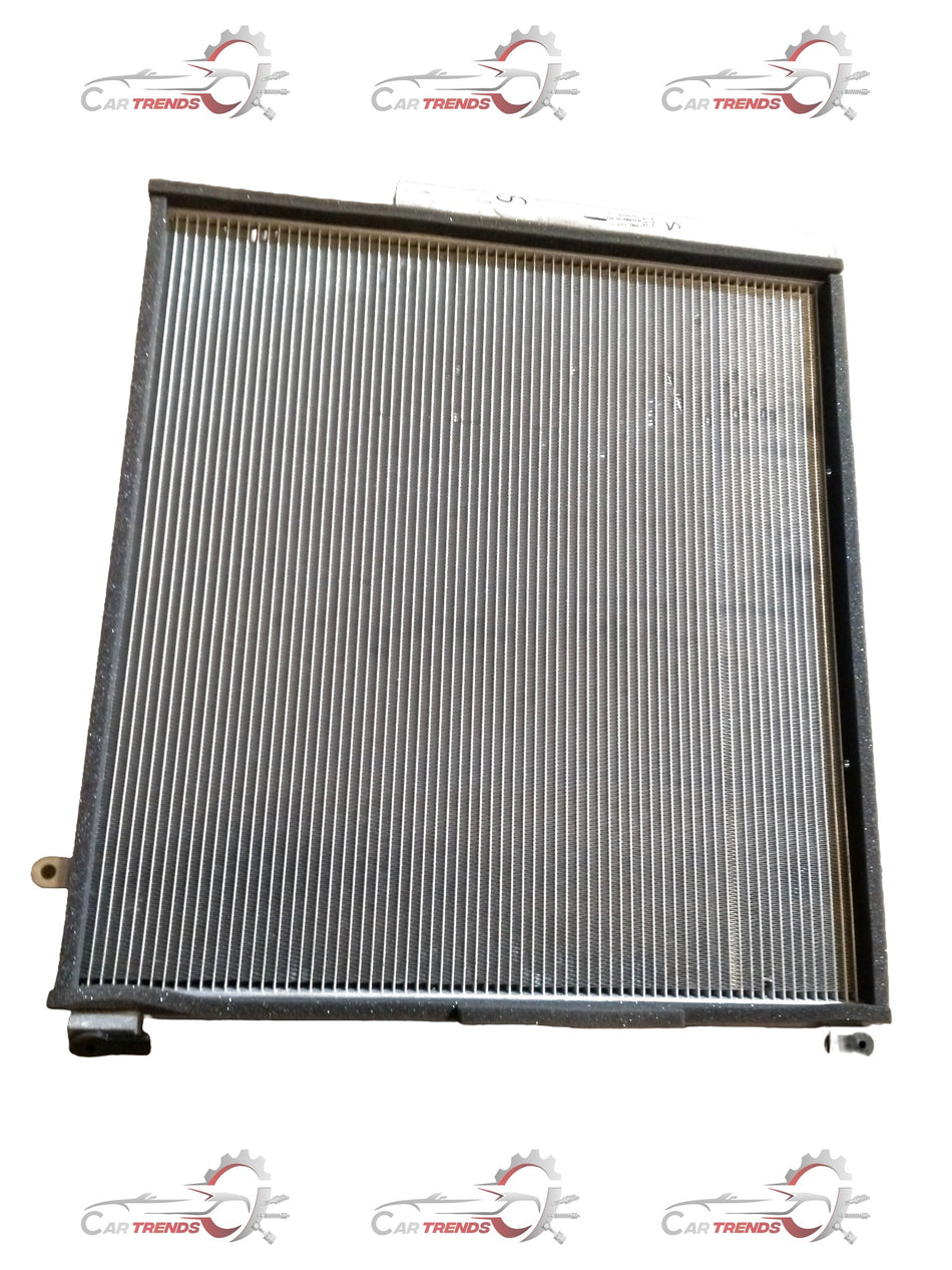 CarTrends AC condenser for Brezza 2nd Gen 2022+ petrol and CNG models, front view showing metal fins and connection points.