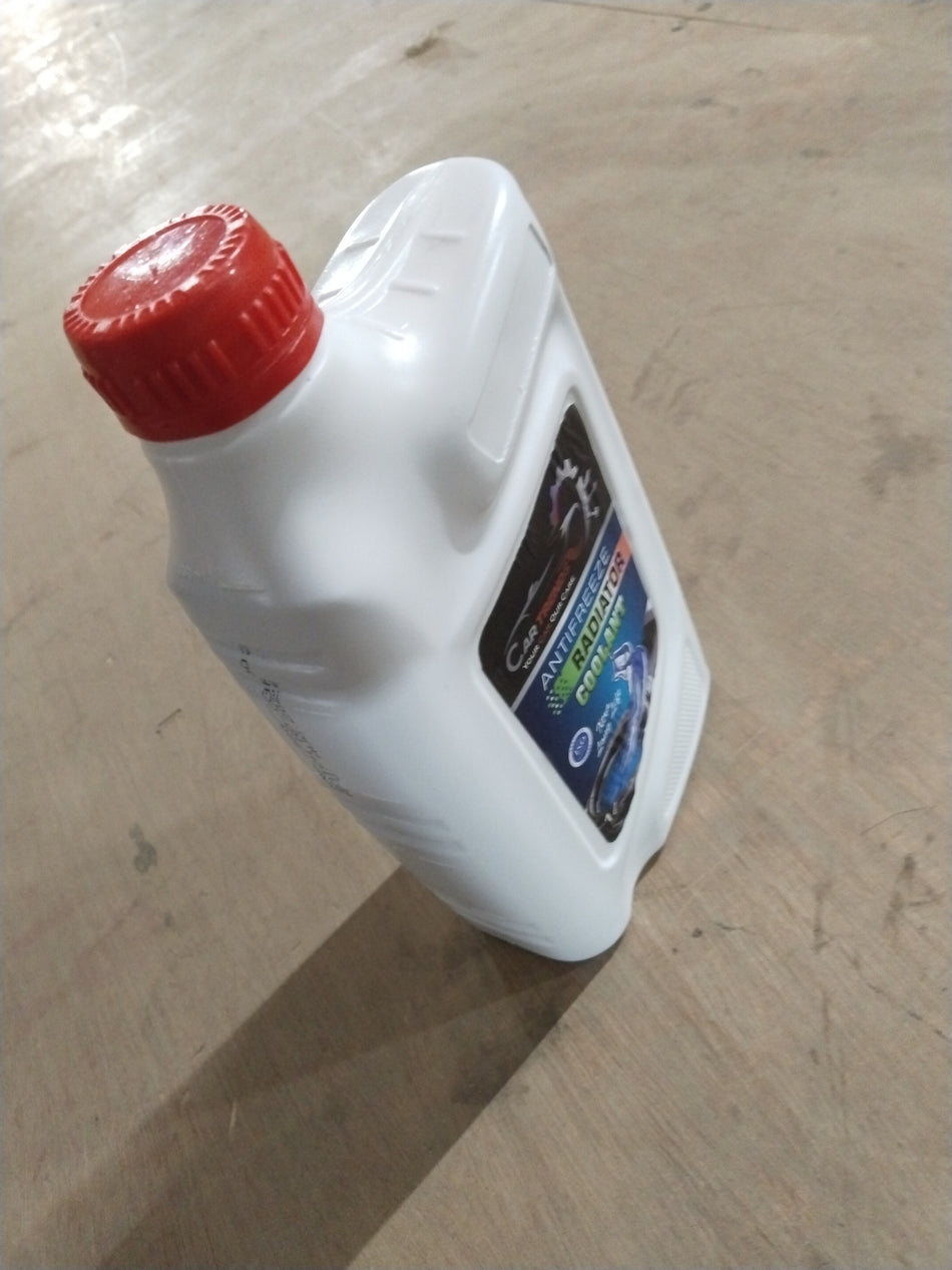 CarTrends blue 1-liter coolant bottle for all cars, showing the label and container with blue liquid inside.