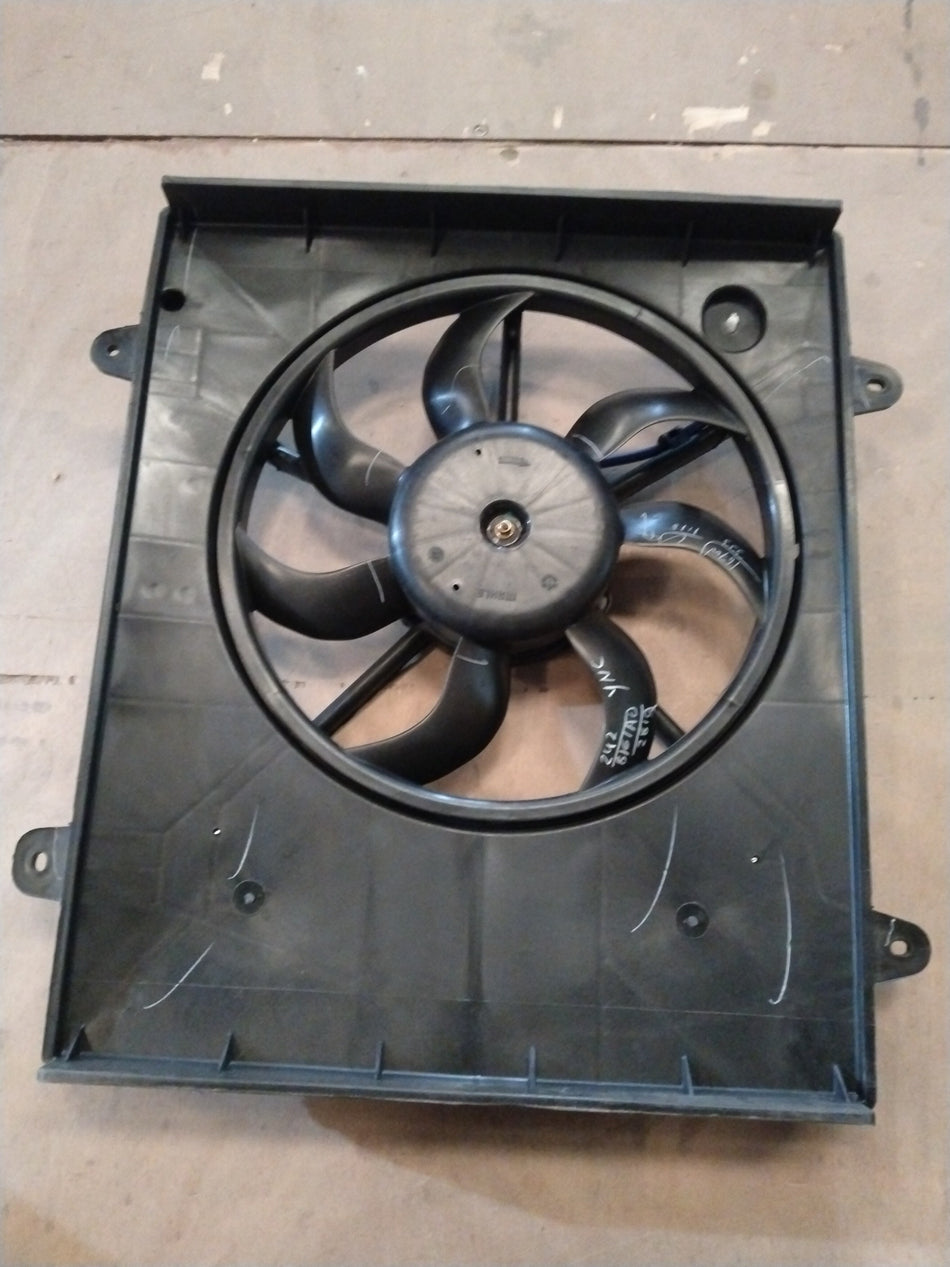 Suzuki Celerio car fan assembly with Maruti branding, shown in the image with blades and mounting components.
