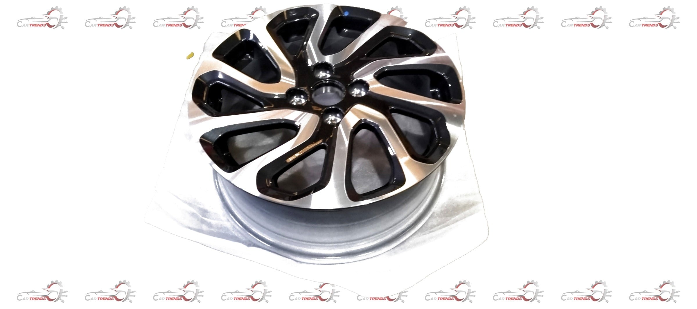 Maruti Suzuki 16x6J alloy wheel rim showing the silver finish and wheel design for vehicle compatibility.