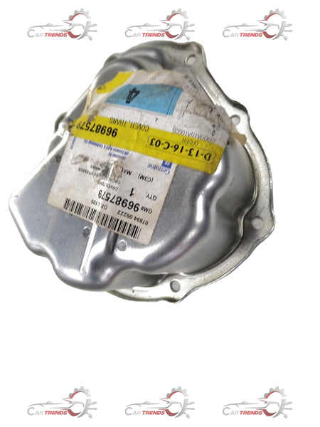 General Motors Chevrolet Beat transmission cover assembly, showing metallic parts with bolts and mounting points.
