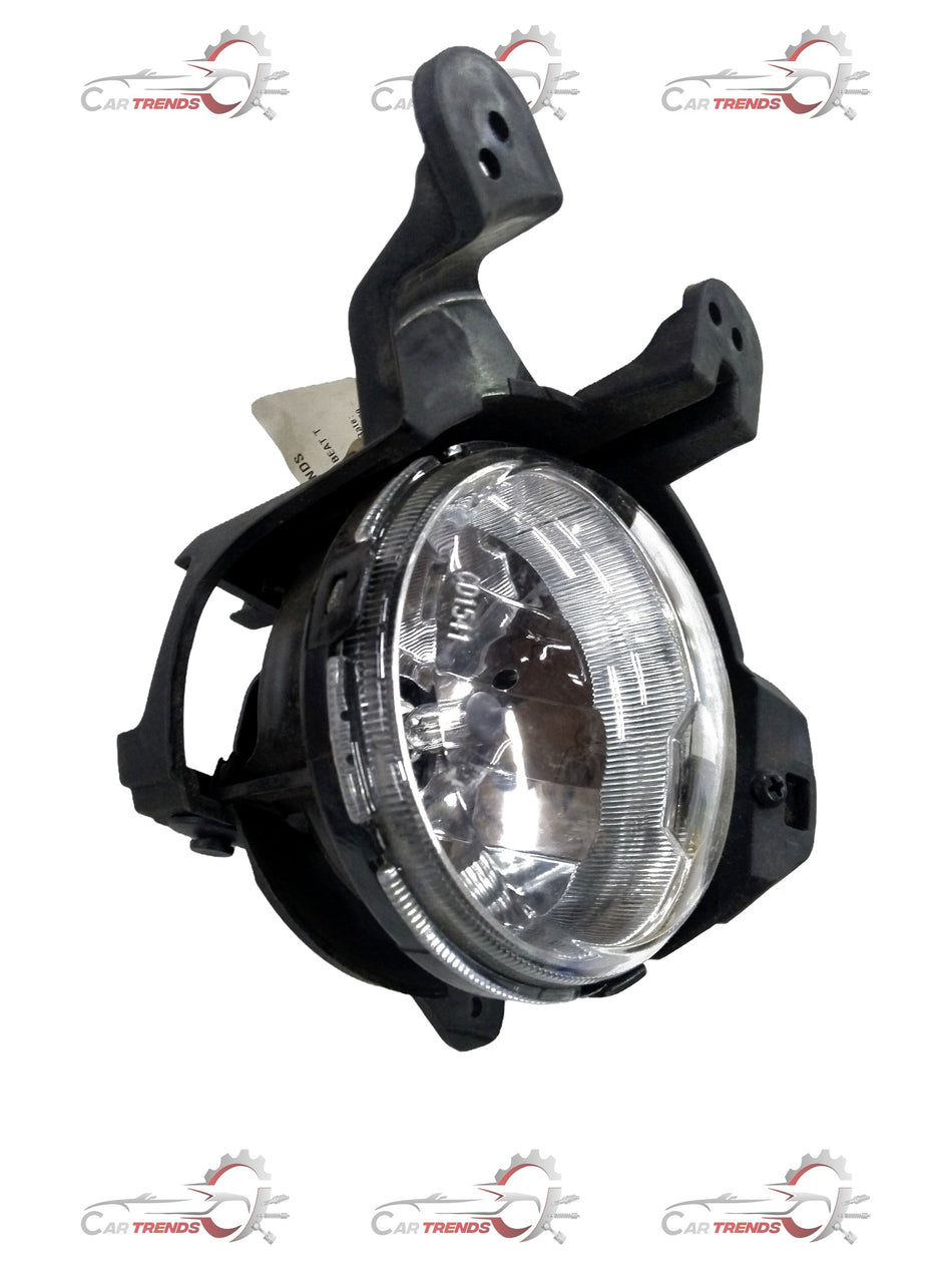 Front fog lamp assembly for Chevrolet Beat, manufactured by General Motors, showing the clear lens and mounting bracket.