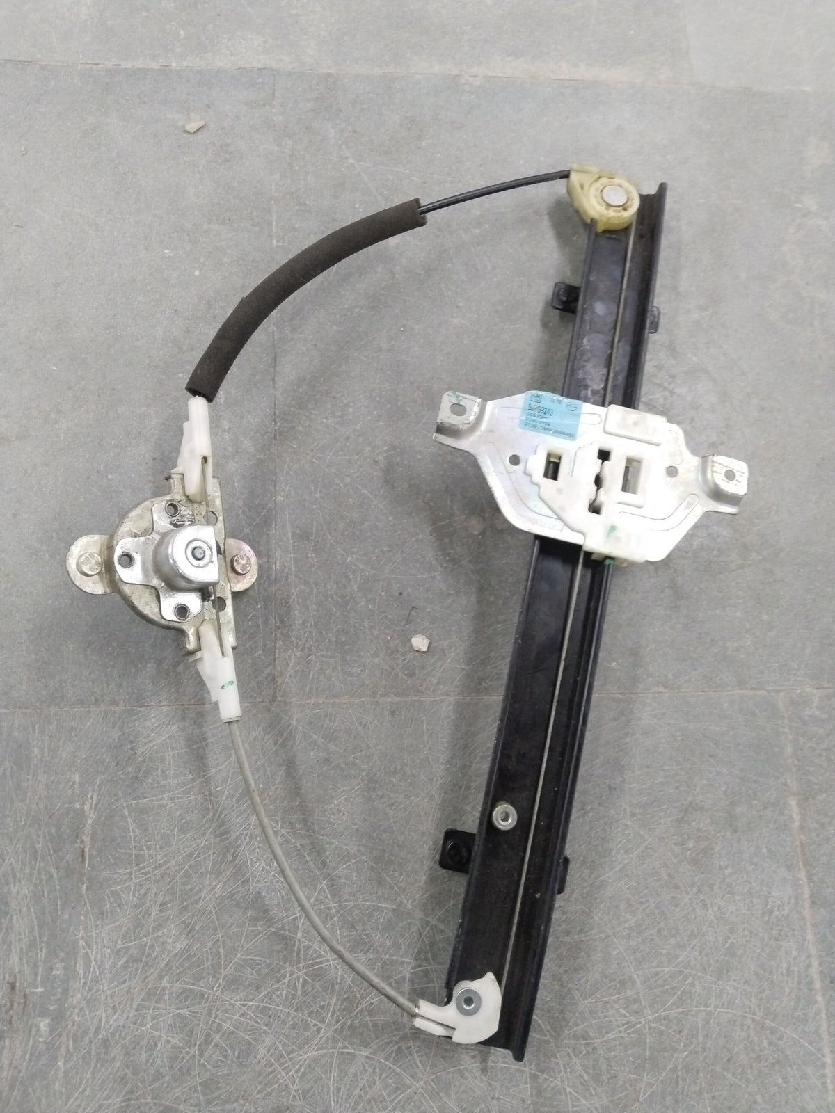 Rear side window regulator assembly for Chevrolet Sail, showing the mechanical components and mounting points.
