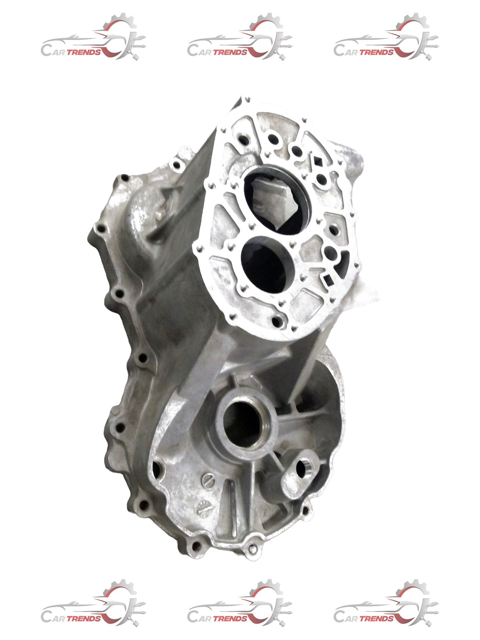 General Motors transmission case, showing metal housing and mounting points for vehicle engine transmission system.