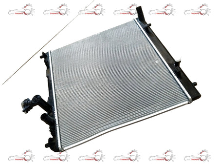 CarTrends Brezza 2nd Gen radiator for 2022+ petrol and CNG models, showing the metal core and inlet/outlet connections.