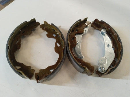 Rear brake shoe for Maruti Swift 1st Gen, Dzire, and Esteem by CarTrends, showing the brake shoe component in detail.