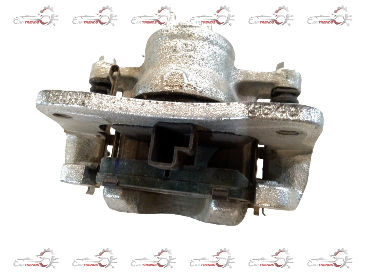 Maruti Suzuki brake caliper for Celerio, left side, CarTrends brand, shown in a close-up image with mounting details.