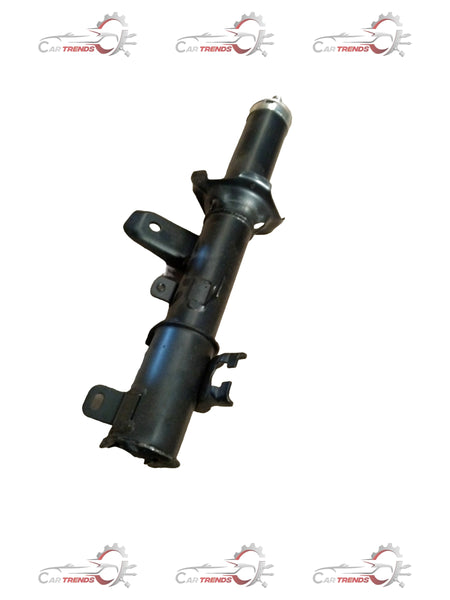 Maruti Suzuki strut assembly for suspension system, showing the metal coil and mounting components in a detailed view.