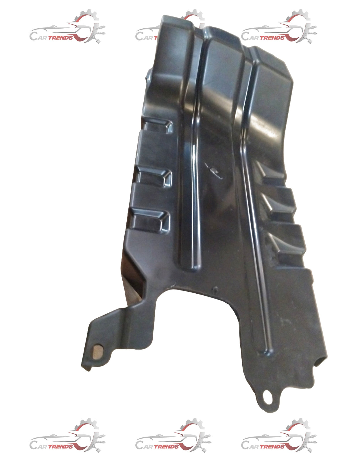 Maruti Suzuki front engine cover showing the protective black plastic shield with mounting points and engine openings.