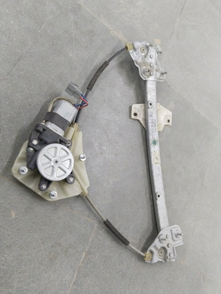 Front left electric window regulator assembly for Chevrolet Spark, showing the motor and mechanical parts in a clear image.