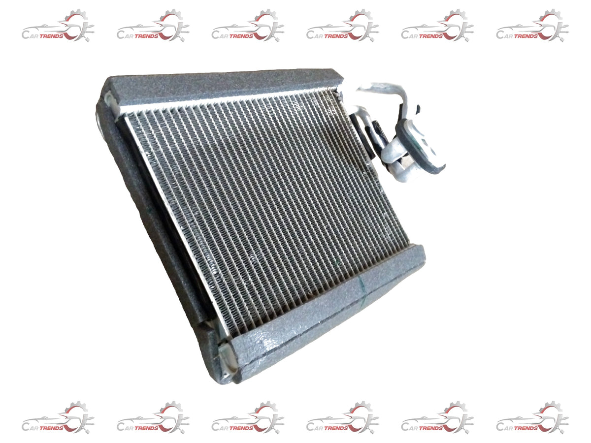 Maruti Suzuki WagonR cooling coil from CarTrends, showing a close-up of the metallic cooling coil part.