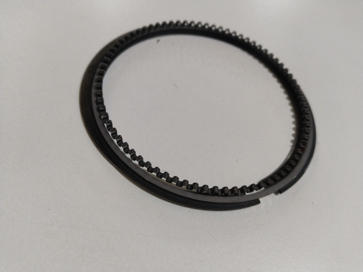 Maruti Suzuki piston ring set for Wagon R, A-Star, Estilo models, showing metal rings with branding and product details.