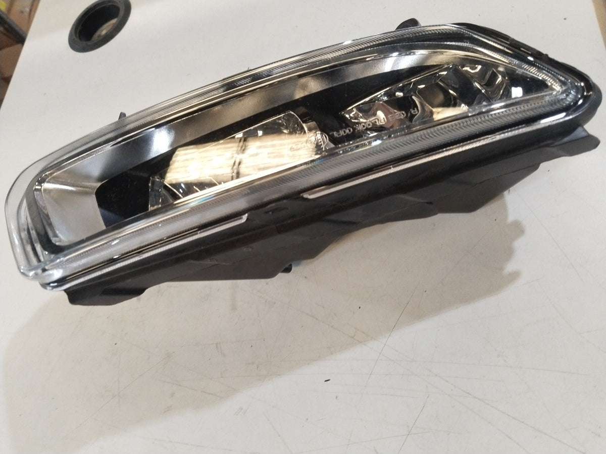 Volkswagen Polo, Vento, Taigun, Tiguan headlight assembly with #6R0941062H part number, showing front view of the headlight unit.
