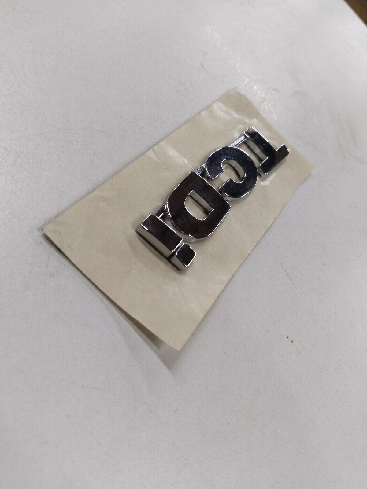 Chevrolet Enjoy rear engine compartment plate assembly lid, general motors part, showing the metal cover with mounting details.