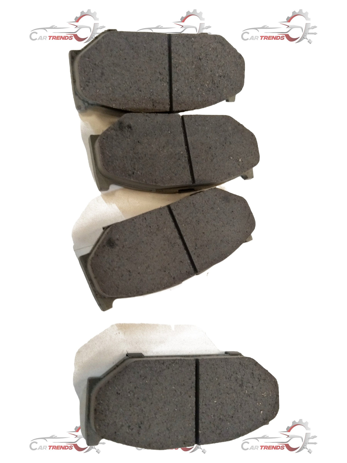 Front brake pad for Maruti Suzuki Ciaz by CarTrends, showing the metallic brake pad with mounting holes.