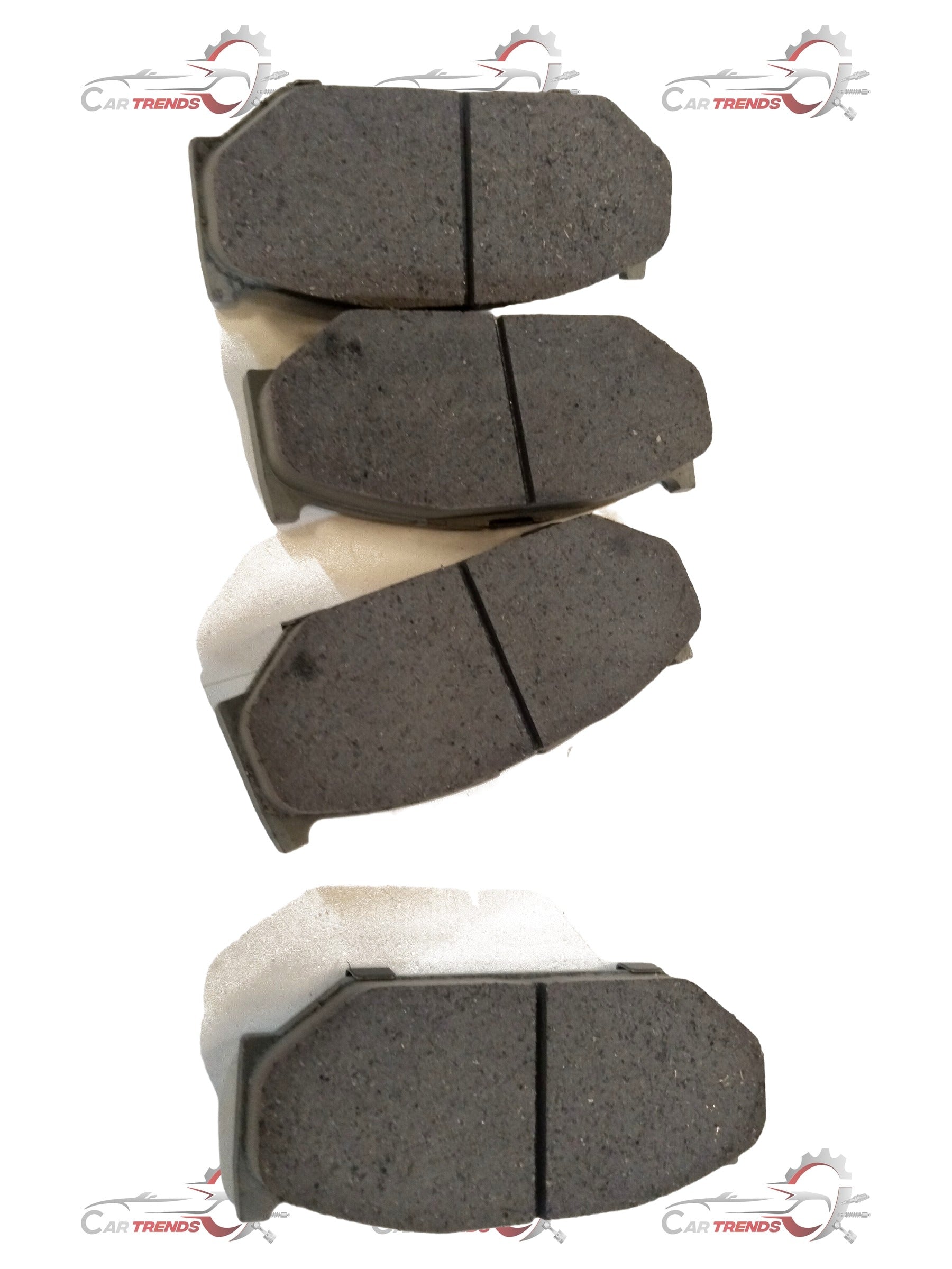 Front brake pad for Maruti Suzuki Ciaz by CarTrends, showing the metallic brake pad with mounting holes.