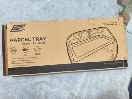 Black parcel tray for Hyundai i20 2020 model by Gfx, shown installed in the cargo area with a textured surface.