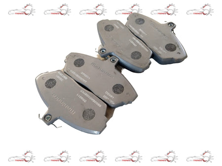 Front brake pad for Mahindra Bolero, genuine Mahindra part, showing the metal brake pad with friction material.